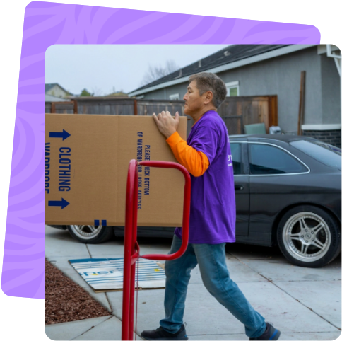 Ventura mover carrying a wardrobe box on a Moorpark move