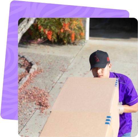 Ventura mover carrying a box during an Ojai move