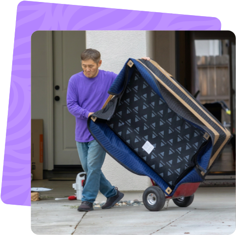 Professional Ventura mover beside the company moving truck